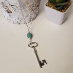 Key charms and Teal Blue Lava Bead