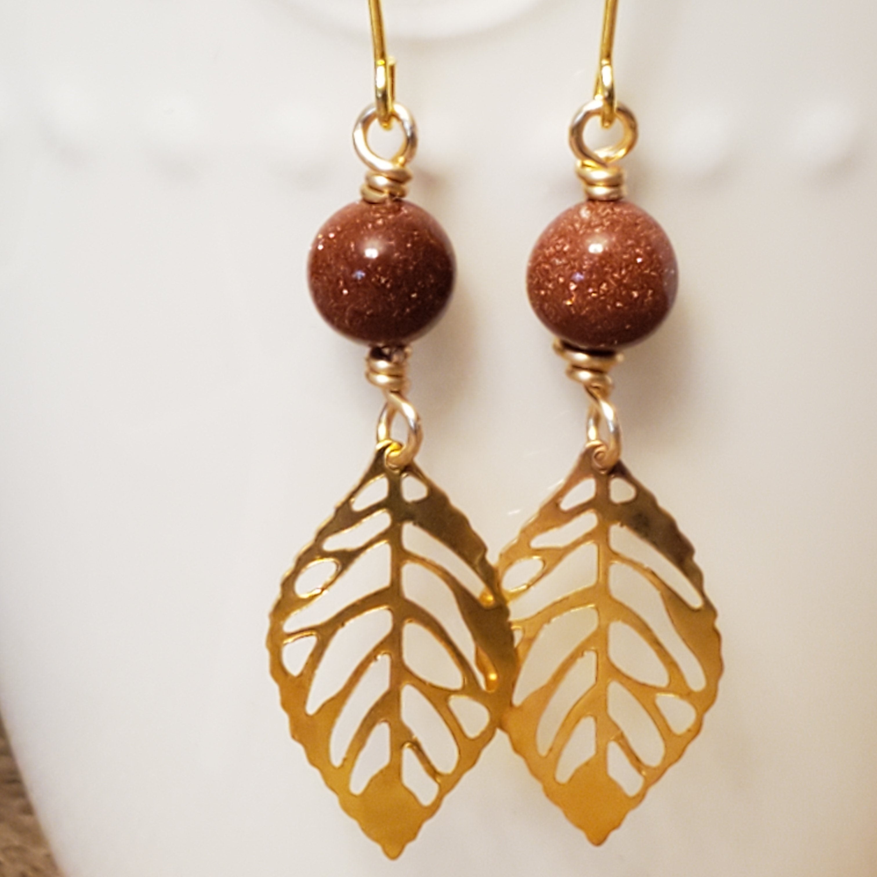 Gold leaf drop earrings with sandstone