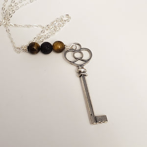 Heart key with tiger eye and lava bead