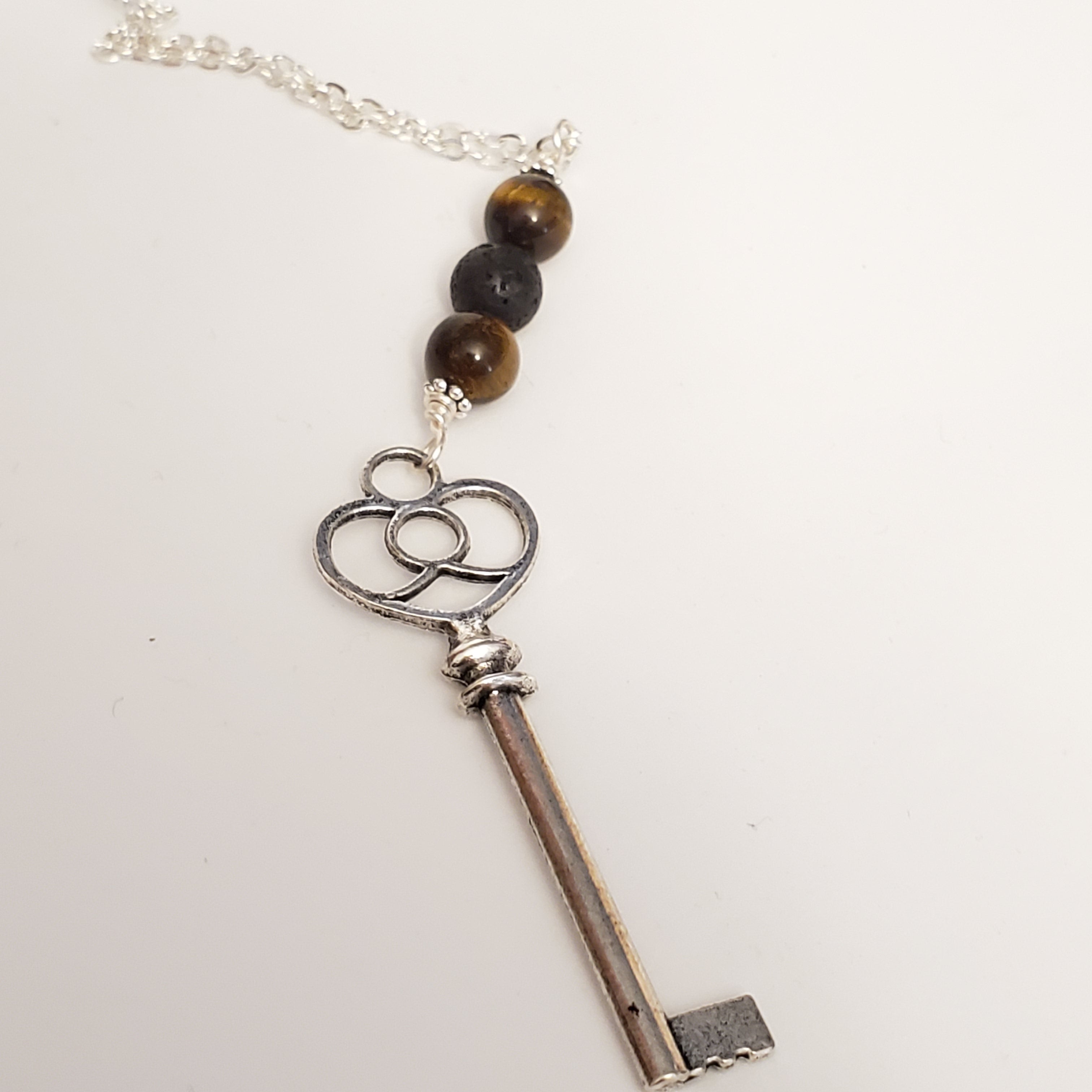 Heart key with tiger eye and lava bead