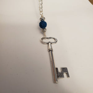 Key with blue lava bead