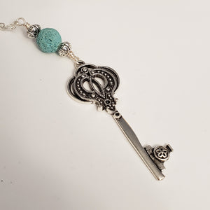 Key with light blue lava bead
